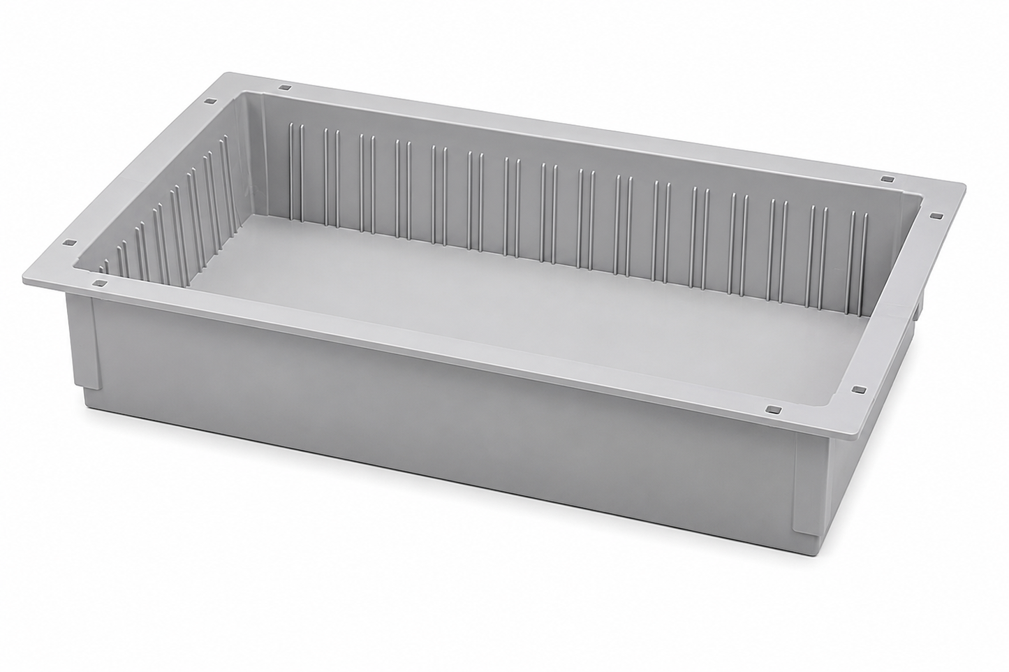 Gray plastic tray with a ribbed surface on a white background