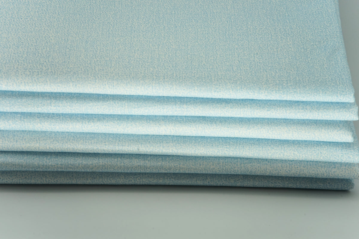 Stack of Procedure Mat on a grey background