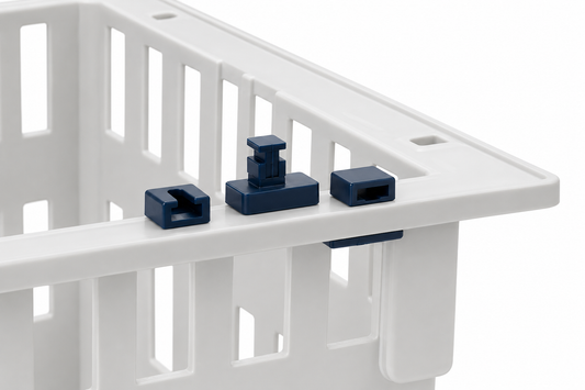 Three dark blue plastic locking clips shown on the rim of a white plastic storage crate against a white background.