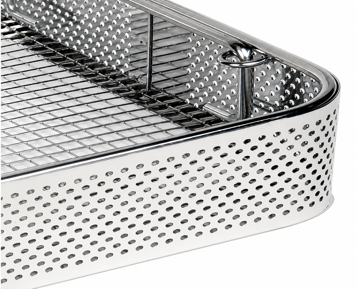 Metal instrument tray with perforated design on a white background