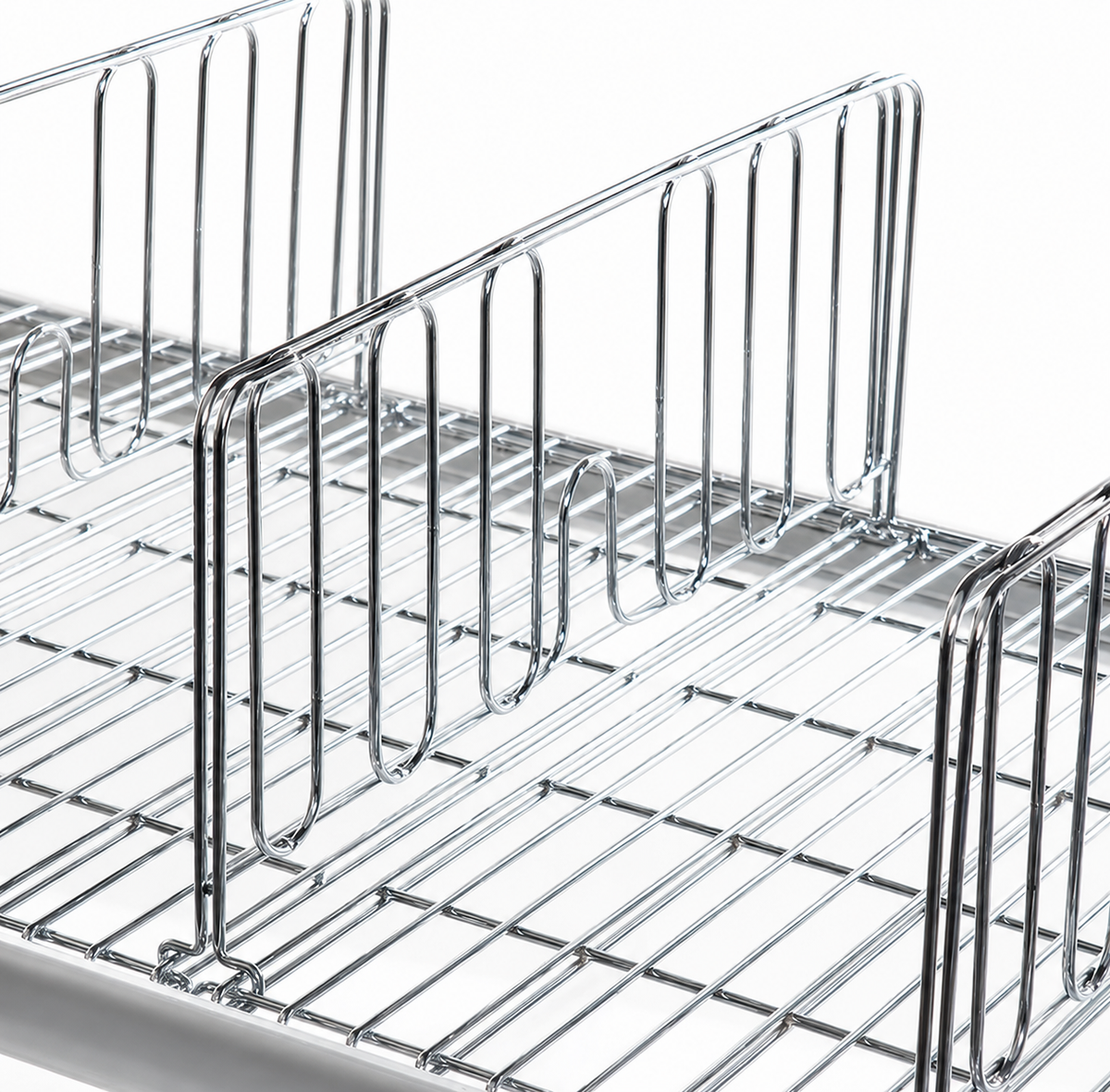 A close-up of a polished stainless steel divider and a slatted base, shown on a white background.