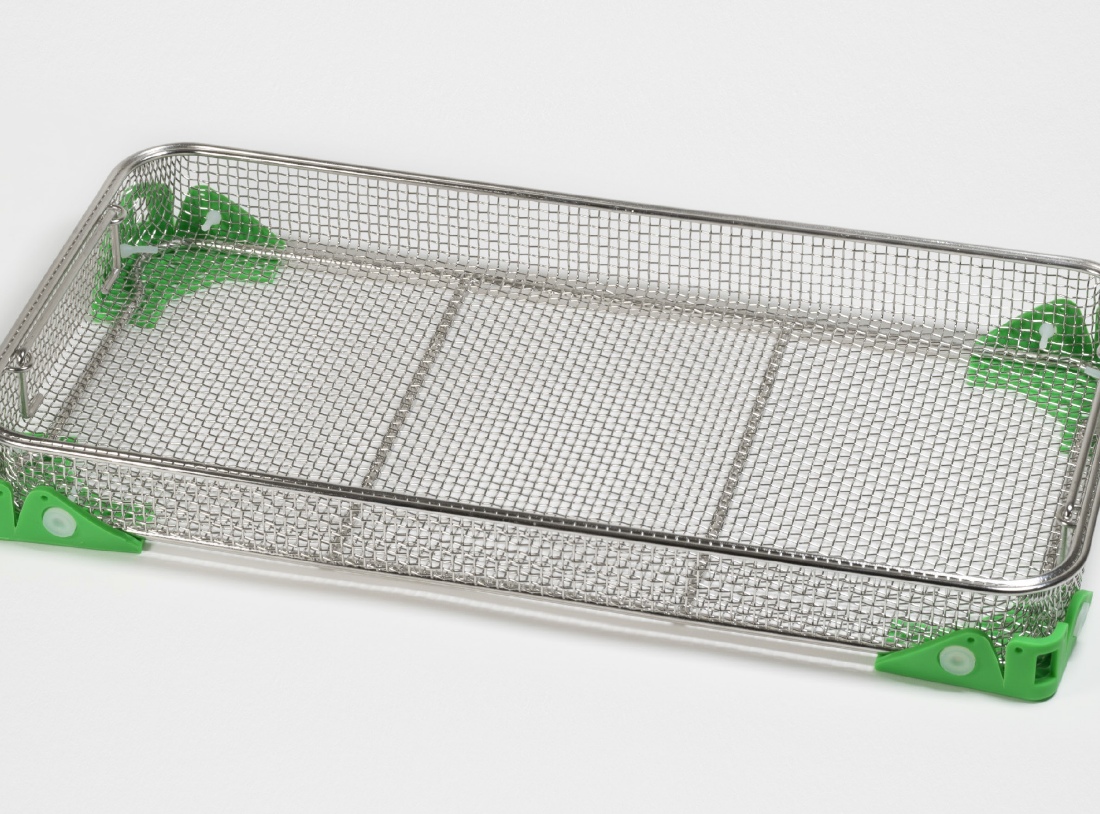 Metal mesh tray with green corners on a white background