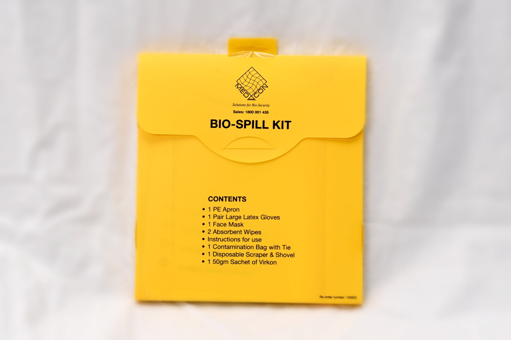 Yellow bio-spill kit packaging with text on a white background