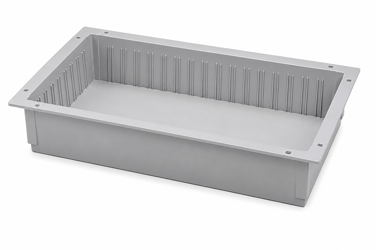 Gray plastic tray with a ribbed surface on a white background