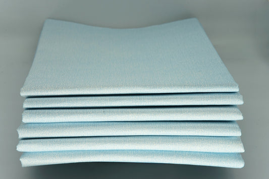 Procedure Mat stacked on a grey background