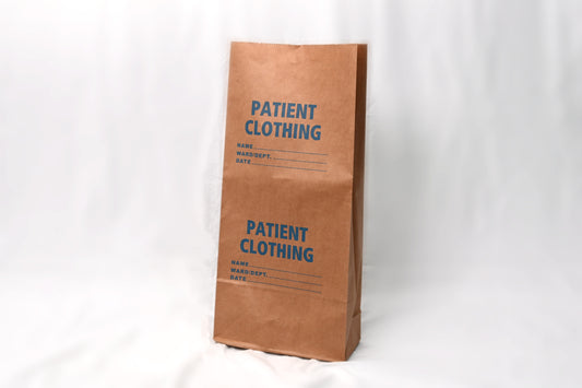 Brown paper bag labeled 'Patient Clothing' on a white background